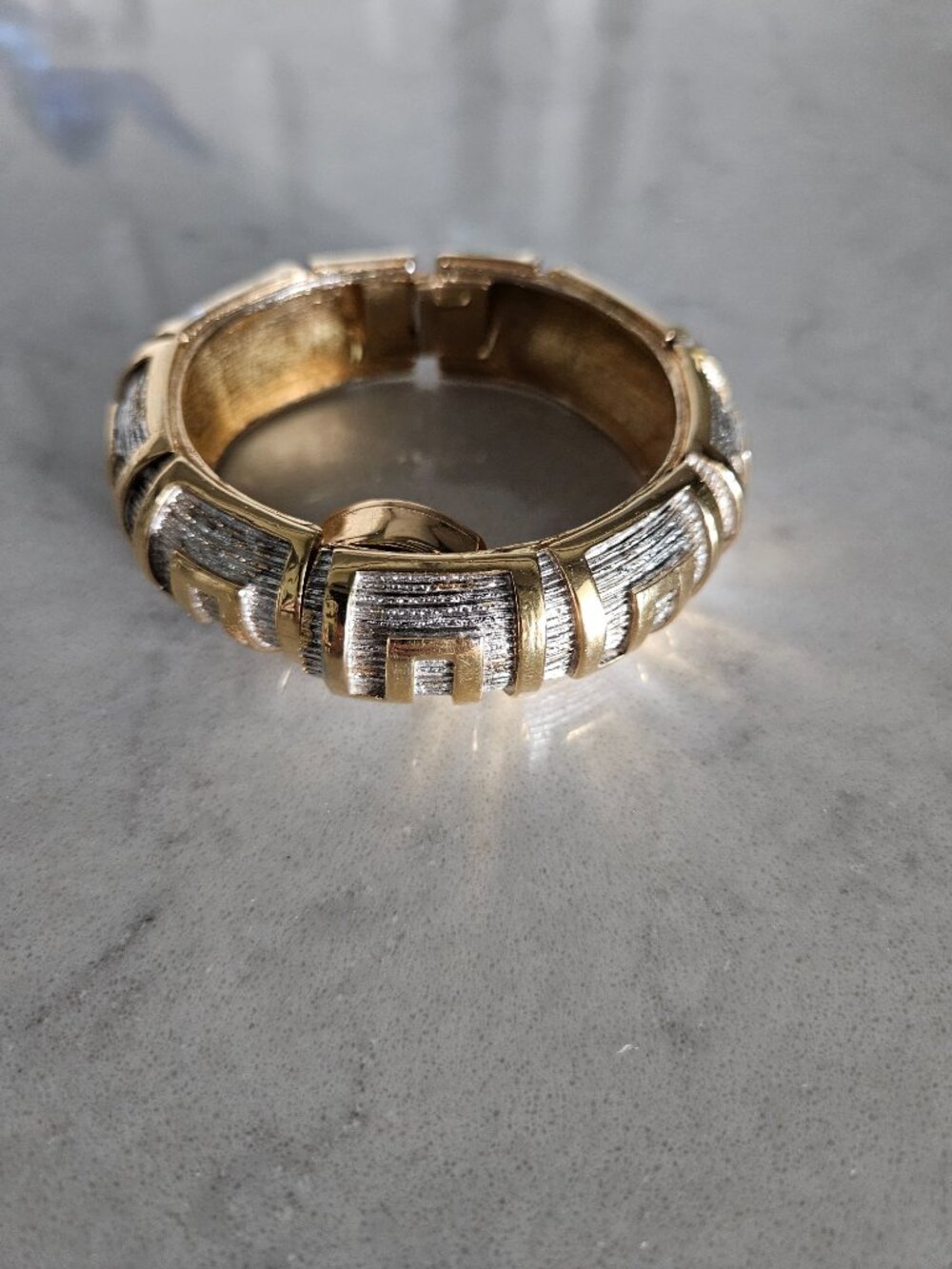 RARE AND VINTAGE WOMENS ORIS GOLD GREEK KEY BANGLE BRACELET WITH COVERED WATCH